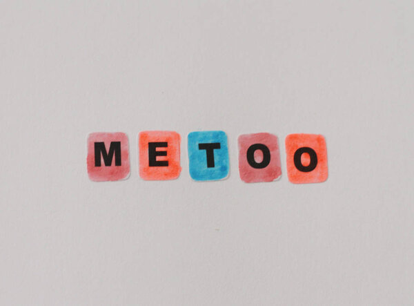Metoo word written in black letters on neutral background