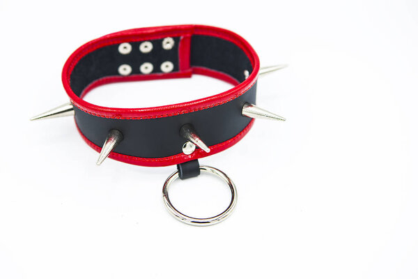 Leather collar with metal spikes isolated on white background
