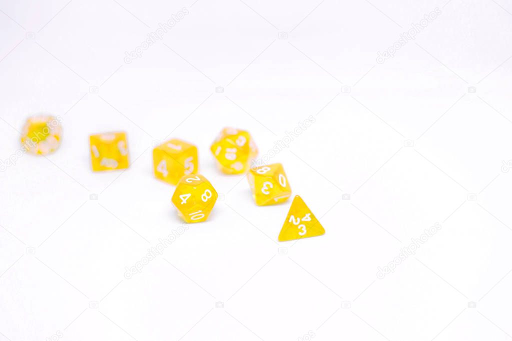 Icon set of yellow  dice for fantasy dnd and rpg tabletop games. Board game polyhedral dices with different sides isolated on white background