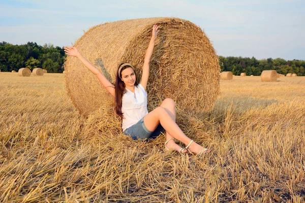 Young Smiling Girl Sits Next Bale Straw Her Hands Portrait — Stock Photo, Image