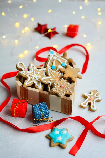 Vertical Christmas Composition Homemade Gingerbread Cookies Garlands Gifts Red Ribbon — Stock Photo, Image