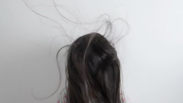 Slow Motion Shot Happy Asian Girl Playing Hair Blowing White — Stock Video