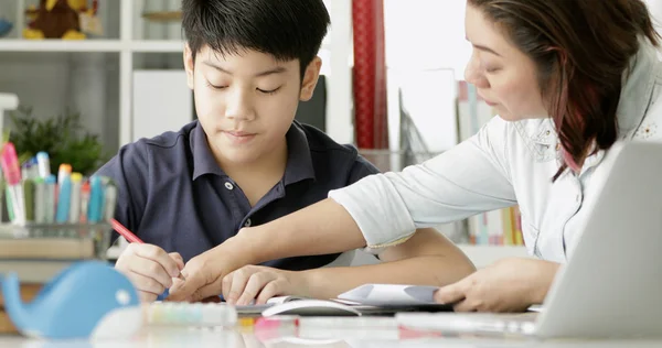 Cute Asian Mother Helping Your Son Doing Your Homework Home — Stock Photo, Image
