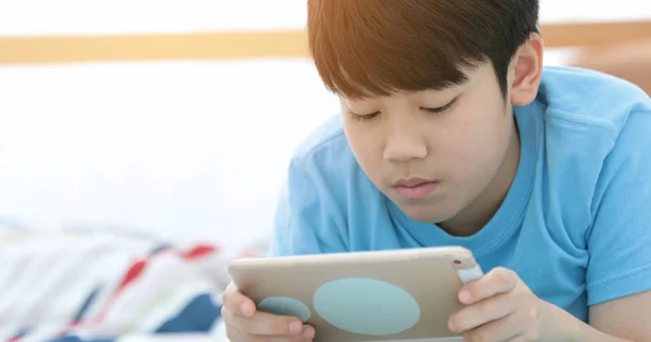 Happy Asian Boy Lying Carpet Playing Game Digital Tablet Home — Stock Photo, Image