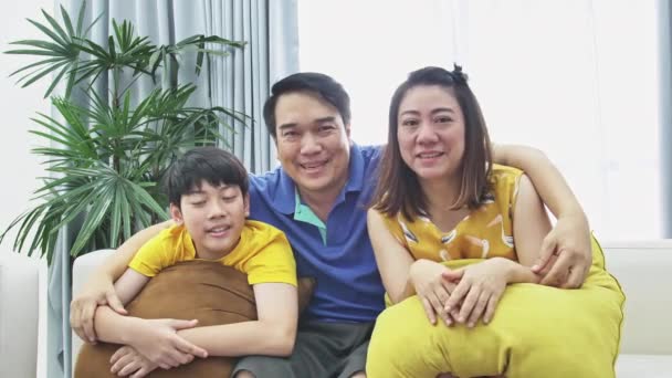 Slow Motion Asian Family Father Mother Son Couch Looking Camera — Stock Video
