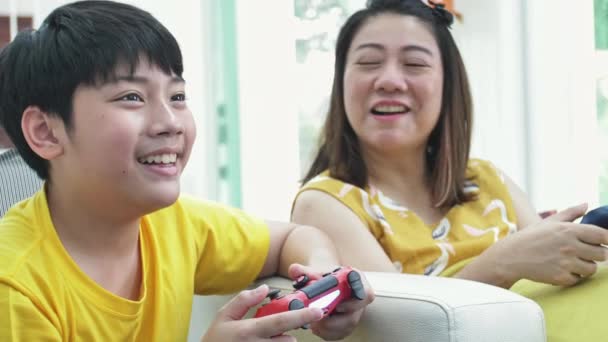 Asian Mother Son Playing Video Game Home Together Slow Motion — Stock Video