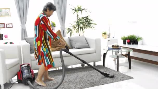 Asian Senior Woman Vacuuming Floor Home Dancing Singing Smile Face — Stock Video