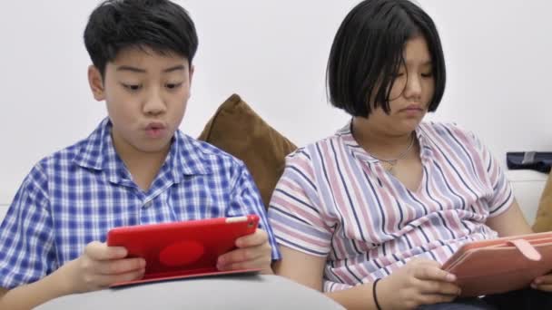 Happy Asian Boy Girl Playing Game Tablet Computer Together Smile — Stock Video
