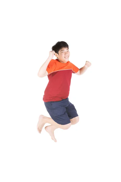 白い背景にジャンプアジアの面白い子供の男の子. — ストック写真