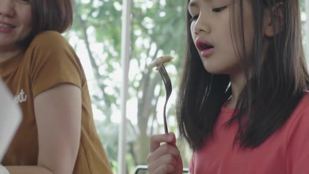 Asian Child Girl Eating Breakfast Fork — Stock Video