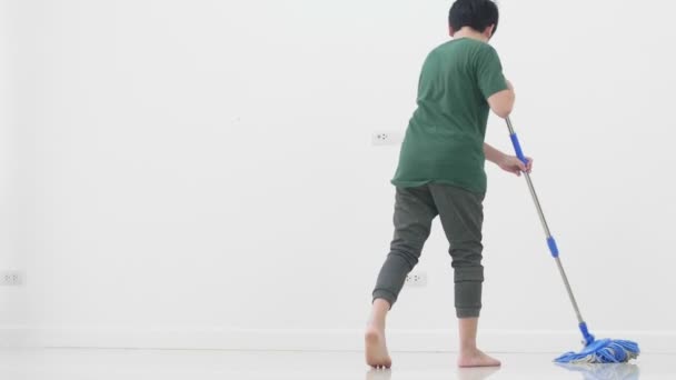 Close Asian Young Boy Help Family Cleaning House Using Mop — Stock Video