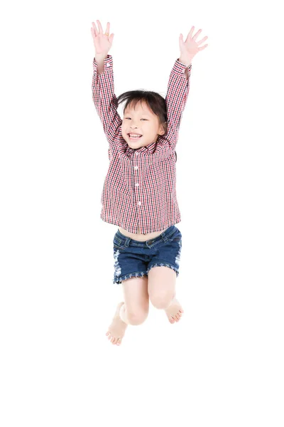 Portrait of happy little Asian child jumping isolated on white — Stock Photo, Image