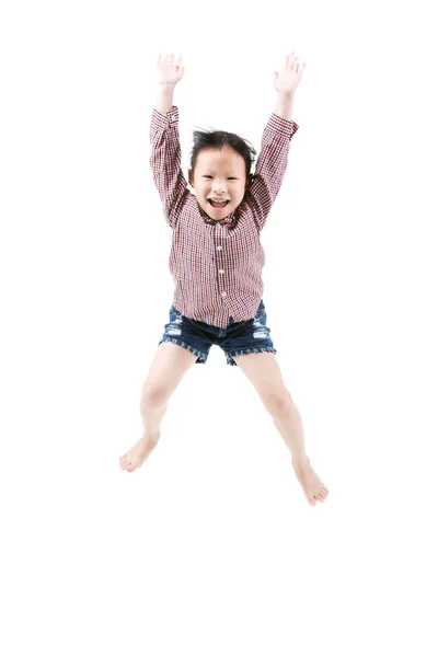 Portrait of happy little Asian child jumping isolated on white — Stock Photo, Image