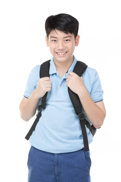 Kitap ile mavi polo t-shirt içinde gülümseyen küçük öğrenci çocuk — Stok fotoğraf