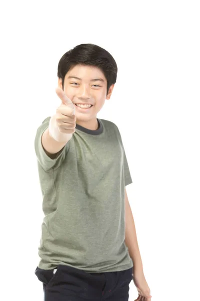 Aziatische opgewonden jongen in groen-shirt geven thumbs-up. — Stockfoto