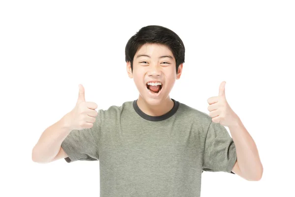 아시아 흥분 소년 에 녹색 셔츠 제공 엄지 손가락. — 스톡 사진