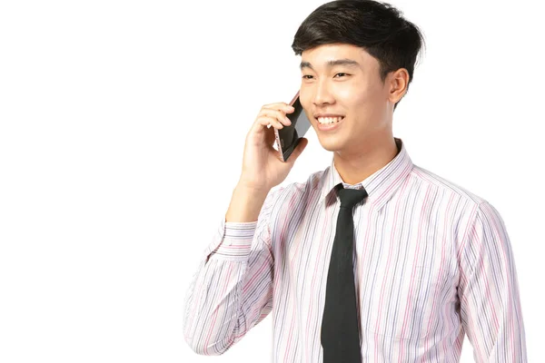 Asiatische Geschäftsmann tragen mit Handy über weiß . — Stockfoto