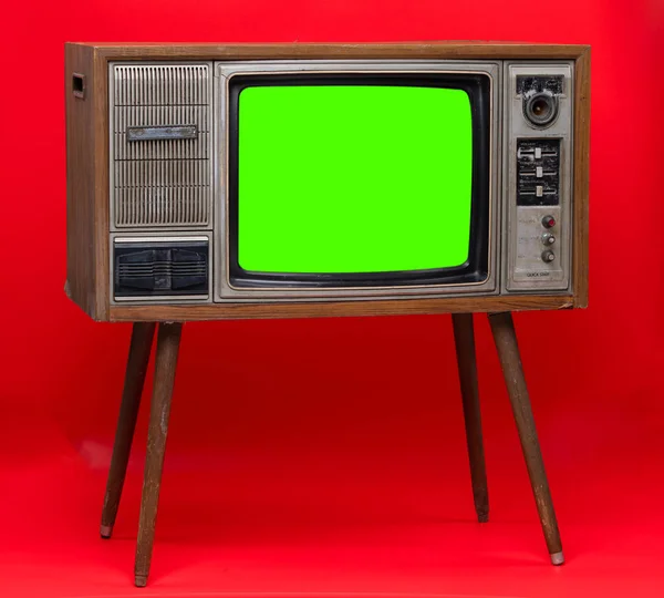 ヴィンテージテレビ:赤い背景に隔離された古いレトロなテレビセット. — ストック写真