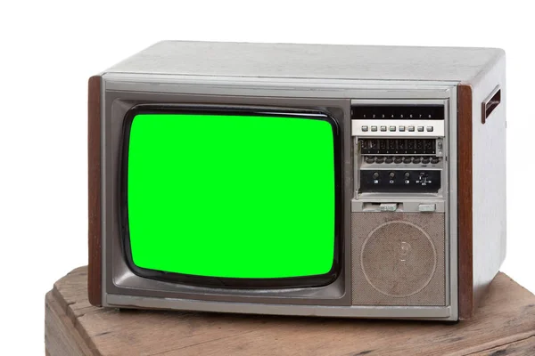 Vintage TV : old retro TV with green screen isolated on white .