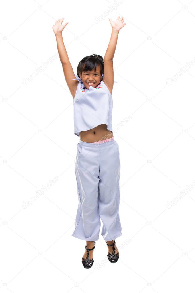 Portrait of Black asian child jumping isolated on white .