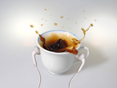                                Üzerine beyaz kulaklık ve kahve sıçraması ile beyaz bir fincan
