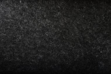 Yumuşak keçeli yün tekstilin gri arkaplanı