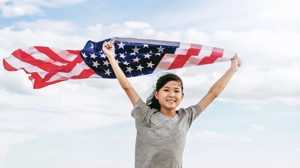 Happy asian little girl with American flag USA celebrate 4th of — Stock Photo, Image