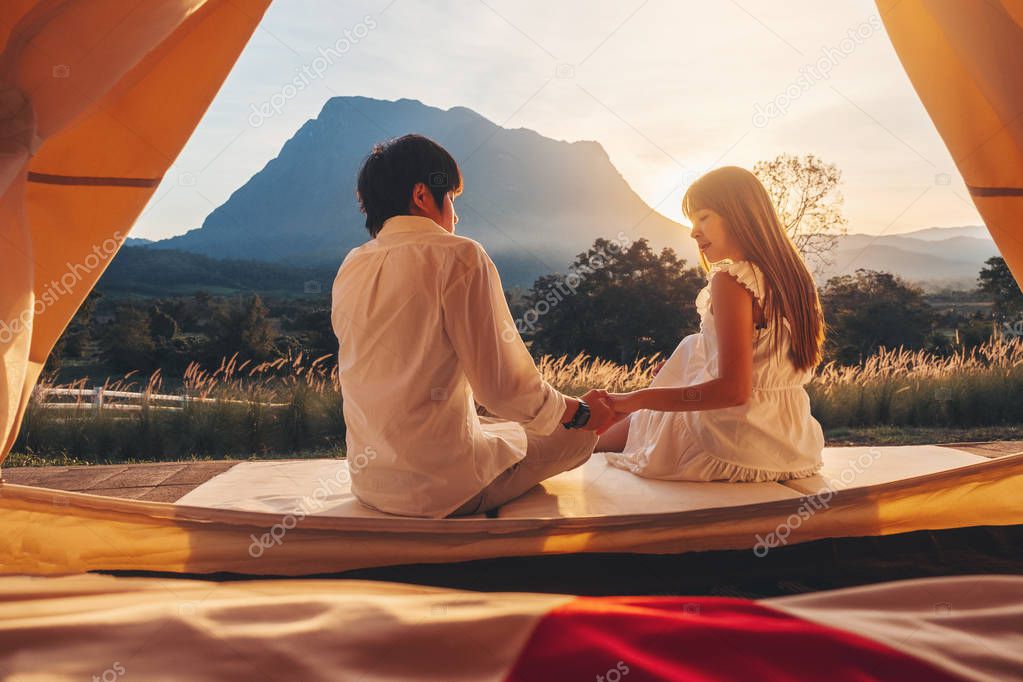 Outdoor watching asian couple