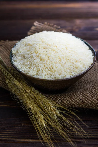 Λευκό Ρύζι Μπολ Και Αυτί Του Paddy Στο Ξύλινο Τραπέζι — Φωτογραφία Αρχείου