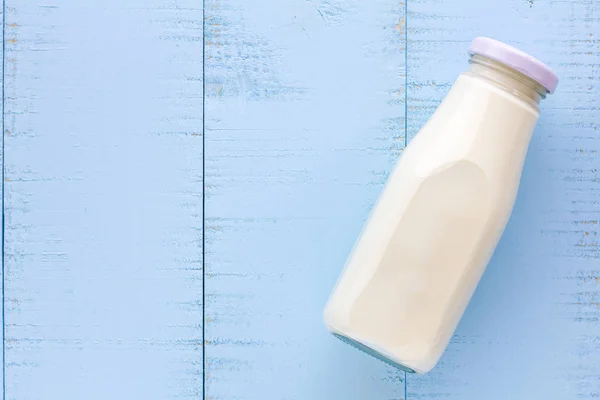 Bottle Milk Blue Wooden Background — Stock Photo, Image