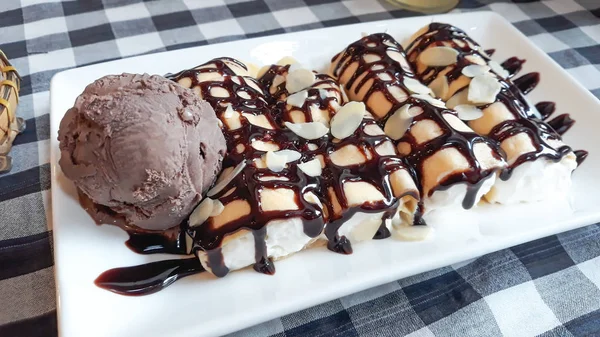 Crape and chocolate icecream on white plate. — Stock Photo, Image