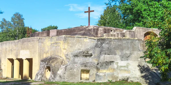 Tomb with jesus cross on top