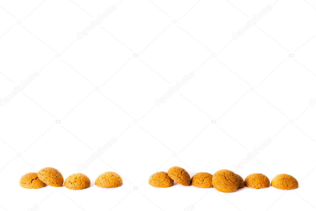 Side view of traditional Dutch Candy called 'Pepernoten' on white background for a Sinterklaas Party