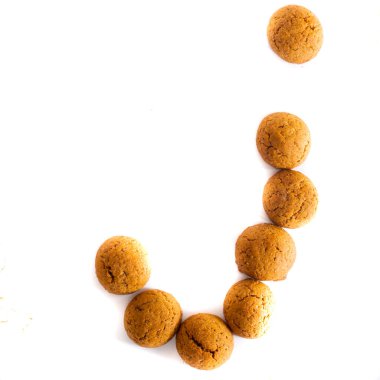 Pepernoten dilinde yazılmış 'J' harfi, 5 Aralık 'taki sinterklaas festivali için iyi bir geleneksel Hollanda şekeri.