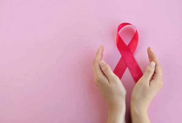 Breast Cancer Awareness Concept Womans Hands Hold Pink Ribbon Light — Stock Photo, Image