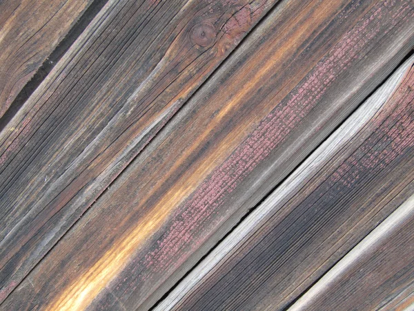 Schöne Textur alter Holzbretter, ungleichmäßig bemalt. Diagonale — Stockfoto