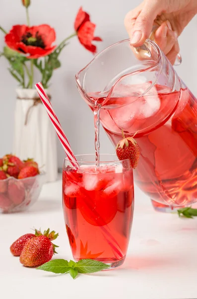 Woman Pours Decanter Summer Cooling Drink Strawberries Ice Vertical Photo — Stock Photo, Image