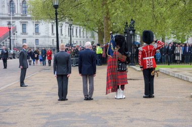 London, UK - April 29, 2018: Veterans and soldiers pay tribute to all those who have lost their lives during all conflicts from first world war to present day. clipart