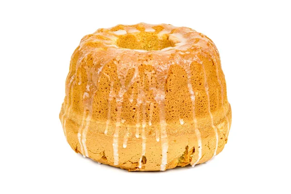 Bundt Cake with sugar glaze on white background — Stock Photo, Image