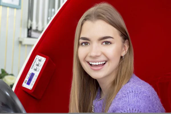 teeth whitening girl smiling with whitened white teeth after the procedure