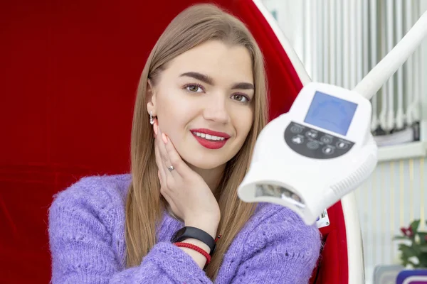 teeth whitening girl smiling with whitened white teeth after the procedure