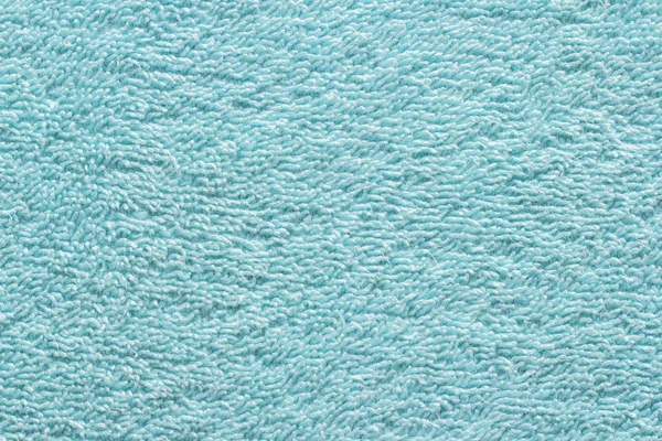 Arka plan için yakın çekim yeşil havlu dokusu. Terry havlu. artan doku