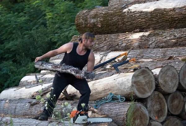 Young Strong Lumberjack Working Wooden Logs Pile — Stock Photo, Image