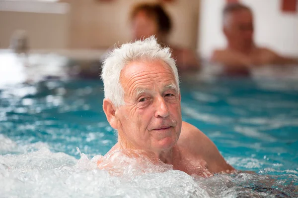Elderly Man Enjoying Pool Hot Water Spa Resort — Stock Photo, Image