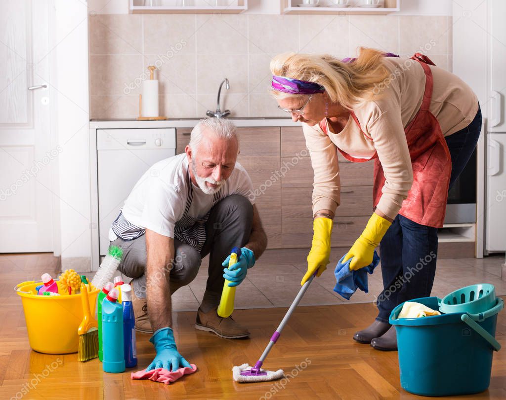 Senior couple doing chores