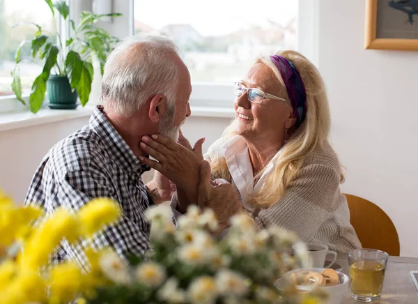 Senior Couple Love Sitting Dining Table Home — Stock Photo, Image