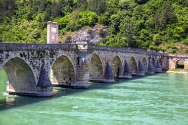 Famous Stone Bridge on the Drina river in Visegrad work Mehmed Pasha Sokolovic, constructed between 1571 and 1577 by architect Mimar Sinan, Bosnia and Herzegovina clipart