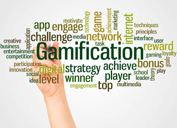 Gamification 単語の雲と白い背景の上のマーカー概念と手 — ストック写真