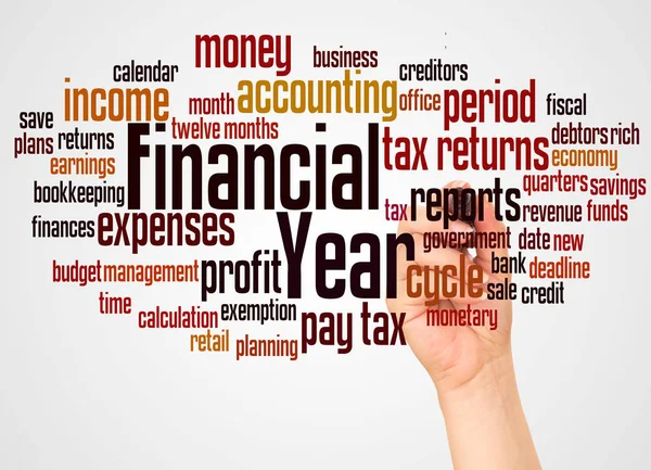 Financiële jaar word cloud en hand met marker concept — Stockfoto