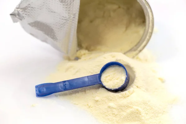 Powdered milk with spoon for baby — Stock Photo, Image